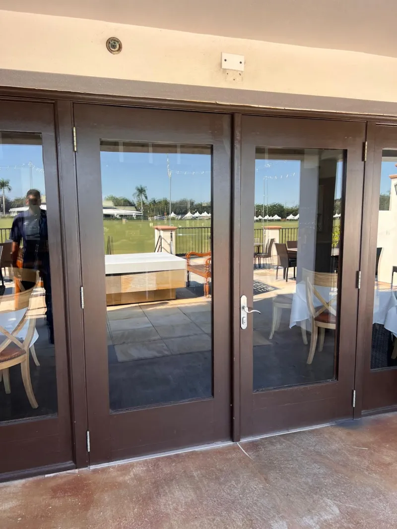 Close-up of a picked lock with scratch marks around the keyway in Stuart FL
