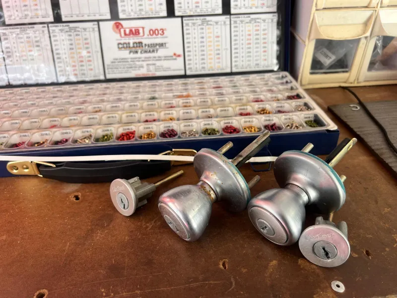 Locksmith performing residential security assessment in Stuart Florida