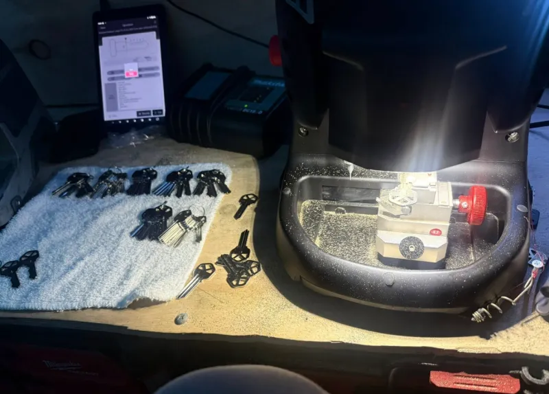 Licensed Stuart Locksmiths technician at residential door in Stuart Florida